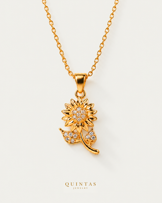 Sunflower Charm Necklace — source-verified cable front view, off-white background, canonical gold logo