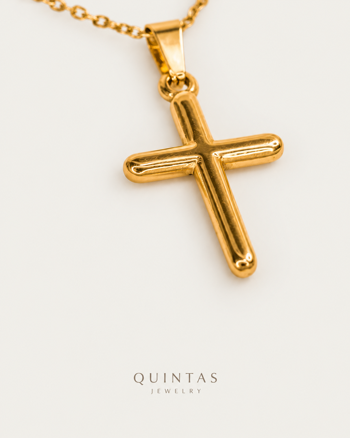 Minimalist Cross Necklace — gold cable chain, genuine oblique angle, neutral greige