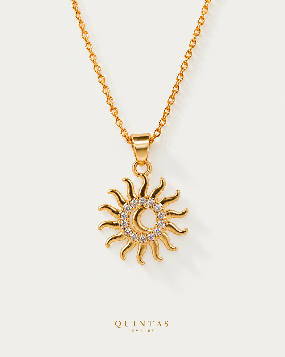 Golden Bohemian Sun Moon Necklace — gold cable chain, hero view, canonical Quintas logo