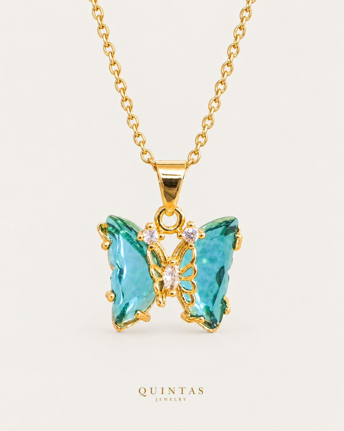 Gemstone Butterfly Necklace Green cable chain main view, canonical Quintas logo