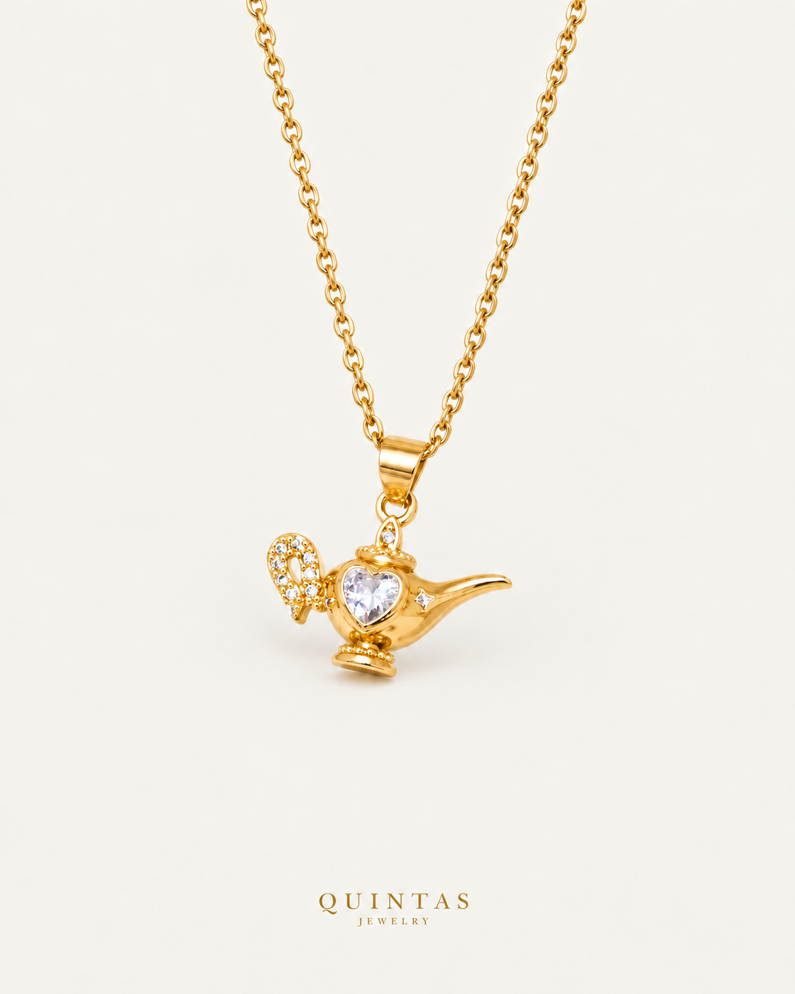 Aladdin Wish Lamp Necklace — source-verified cable oblique view, off-white background, canonical gold logo
