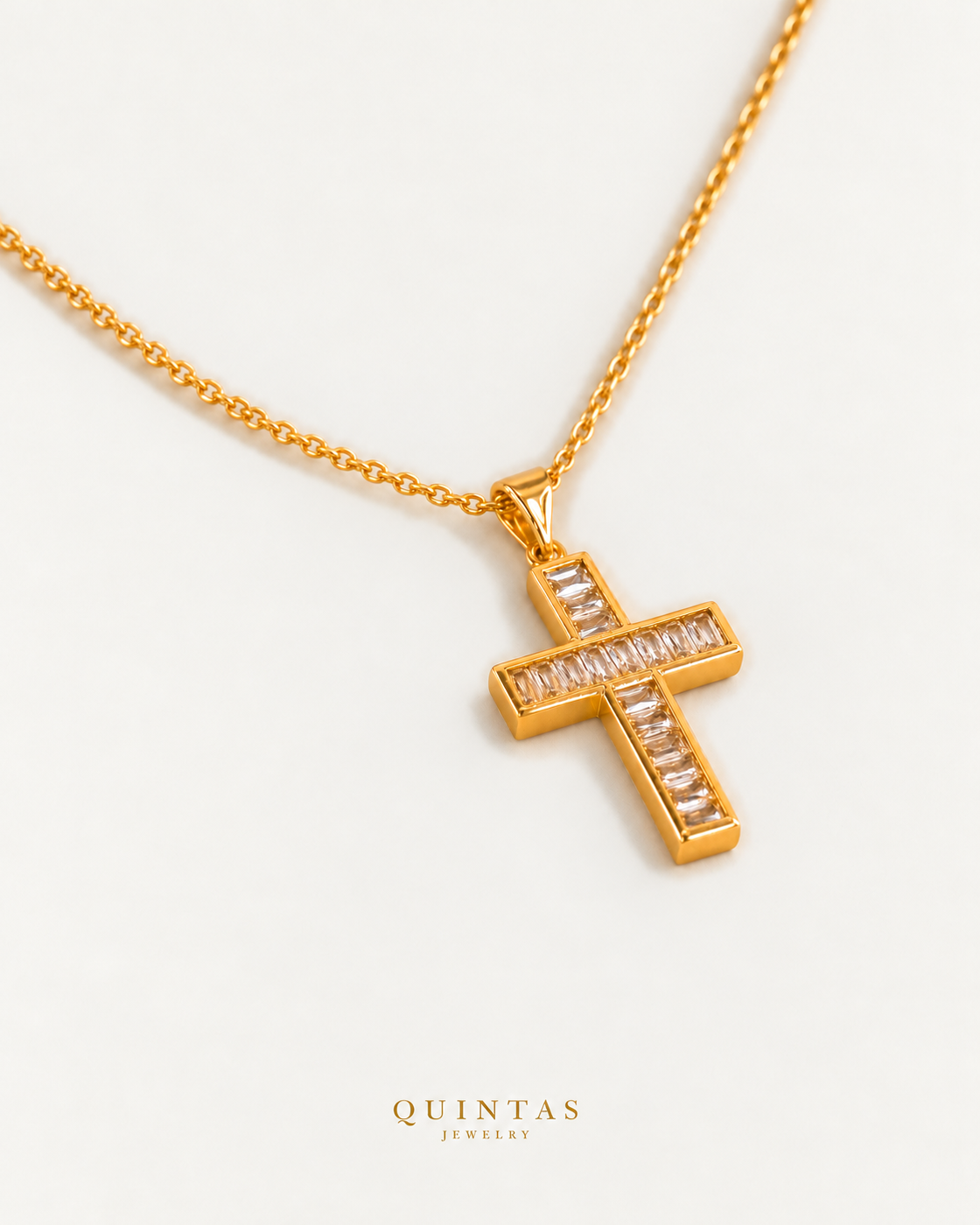 Bold Iced Cross Necklace — source-verified cable oblique view, off-white background, canonical gold logo