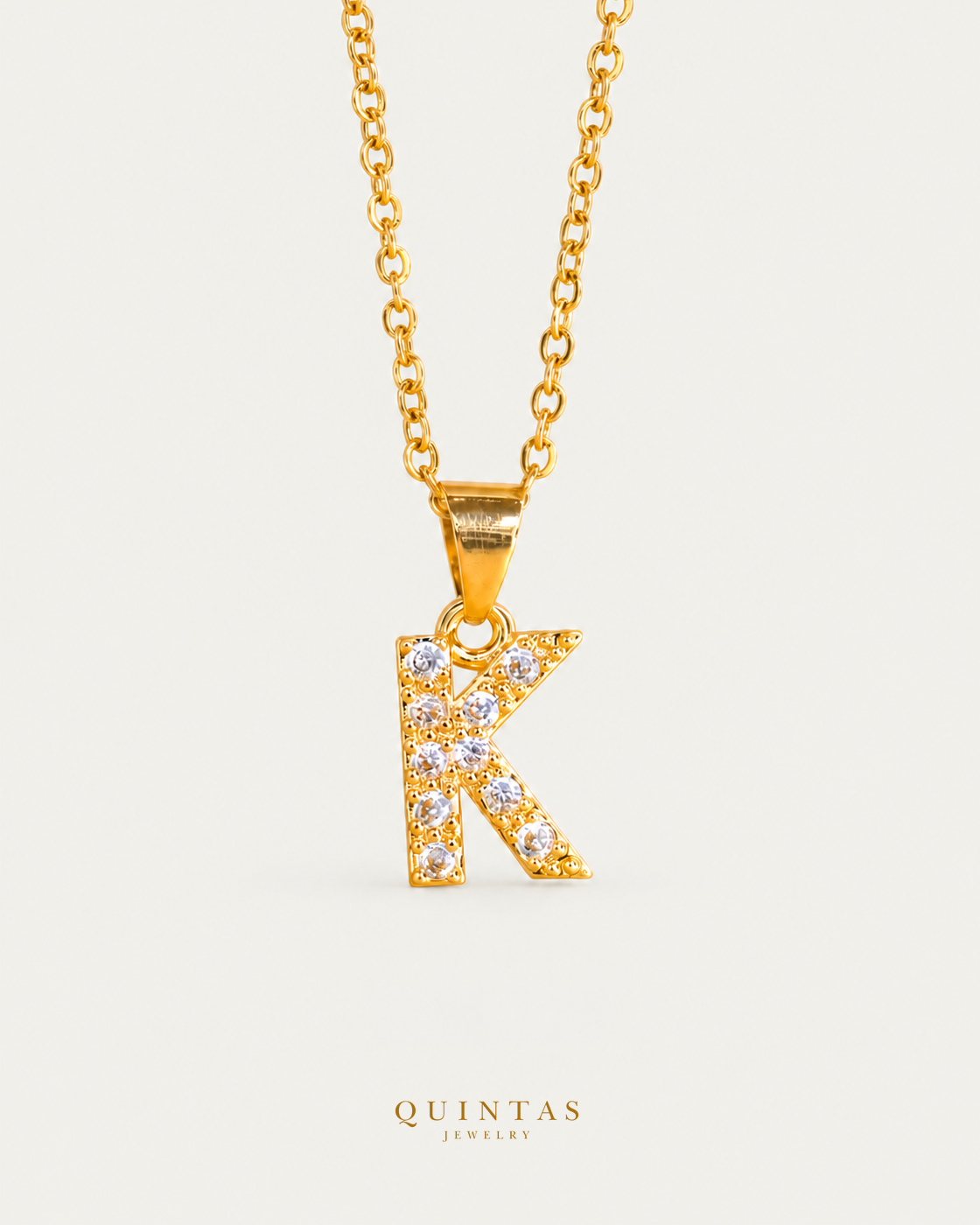 QUINTAS Zirconia Letter Initial Necklace K cable chain main view, canonical Quintas logo