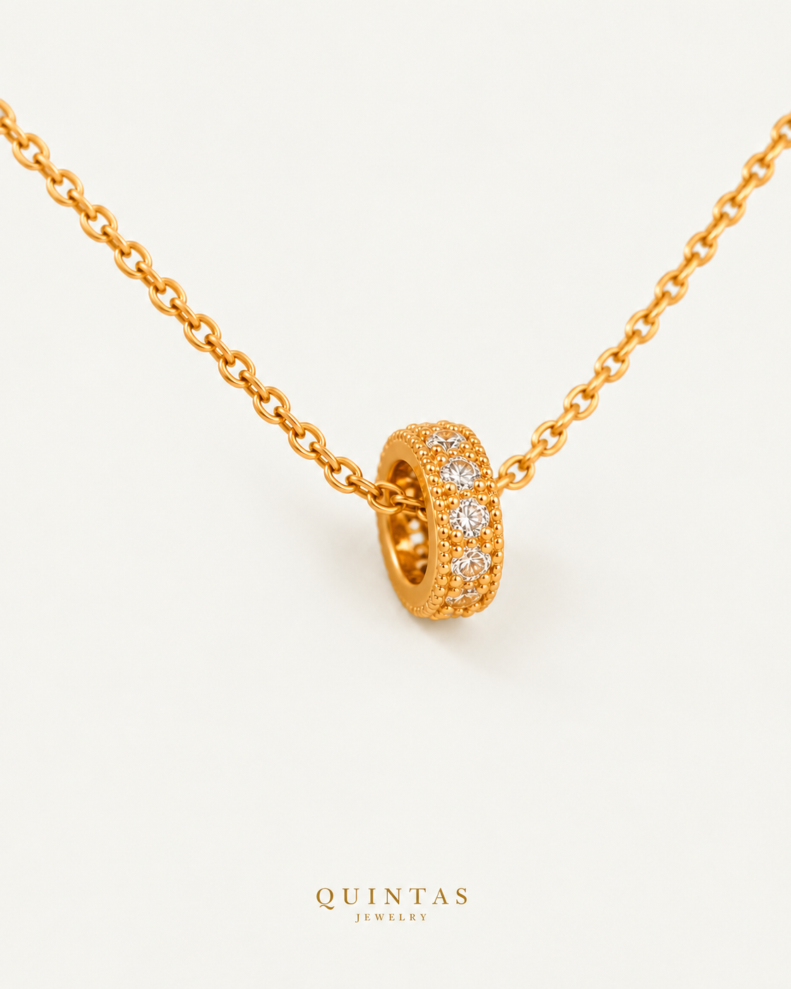 Armani Barrel Necklace — gold cable chain, companion view; canonical Quintas Jewelry logo