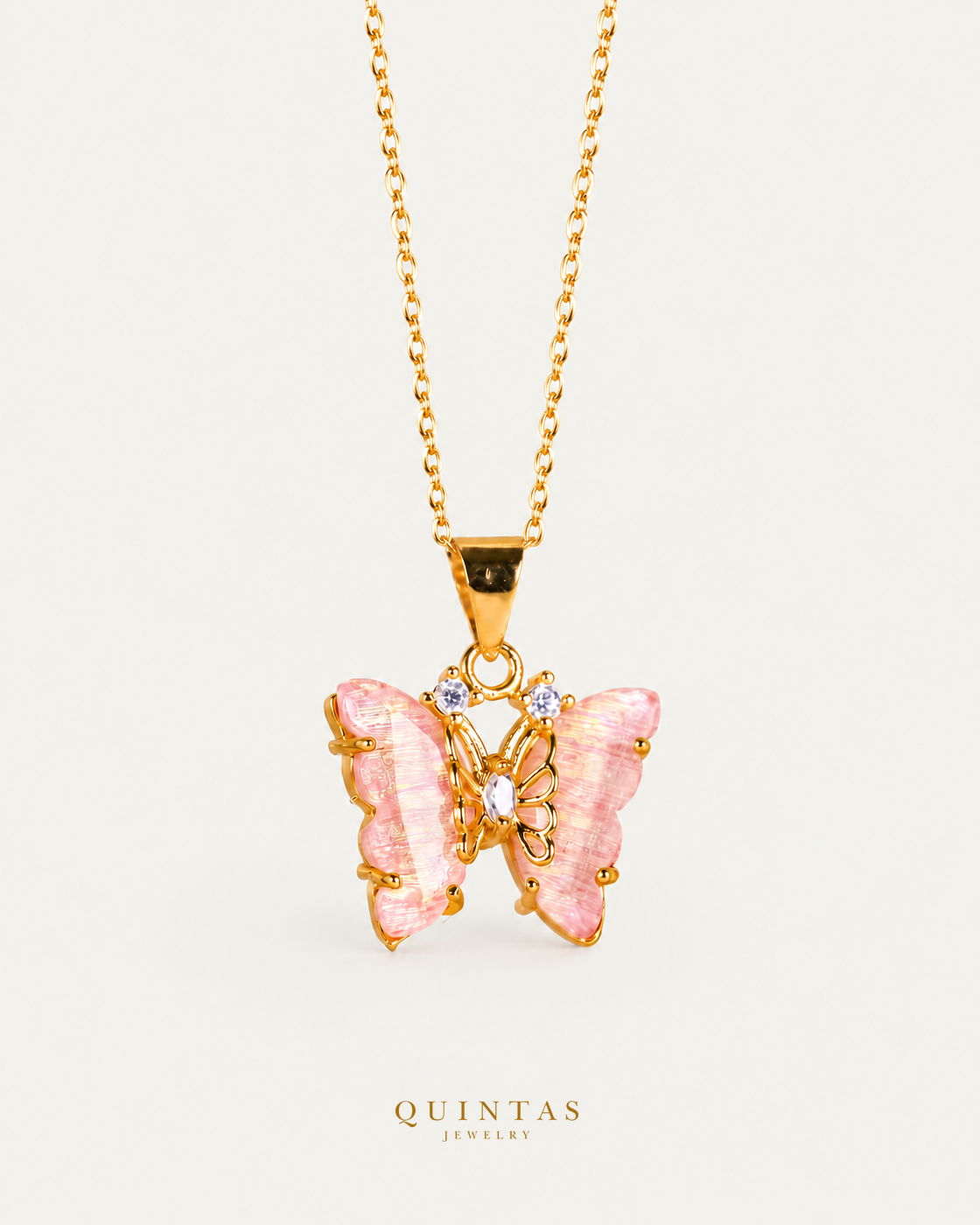 Pastel Butterfly Necklace pink gold cable chain, main view, canonical Quintas logo