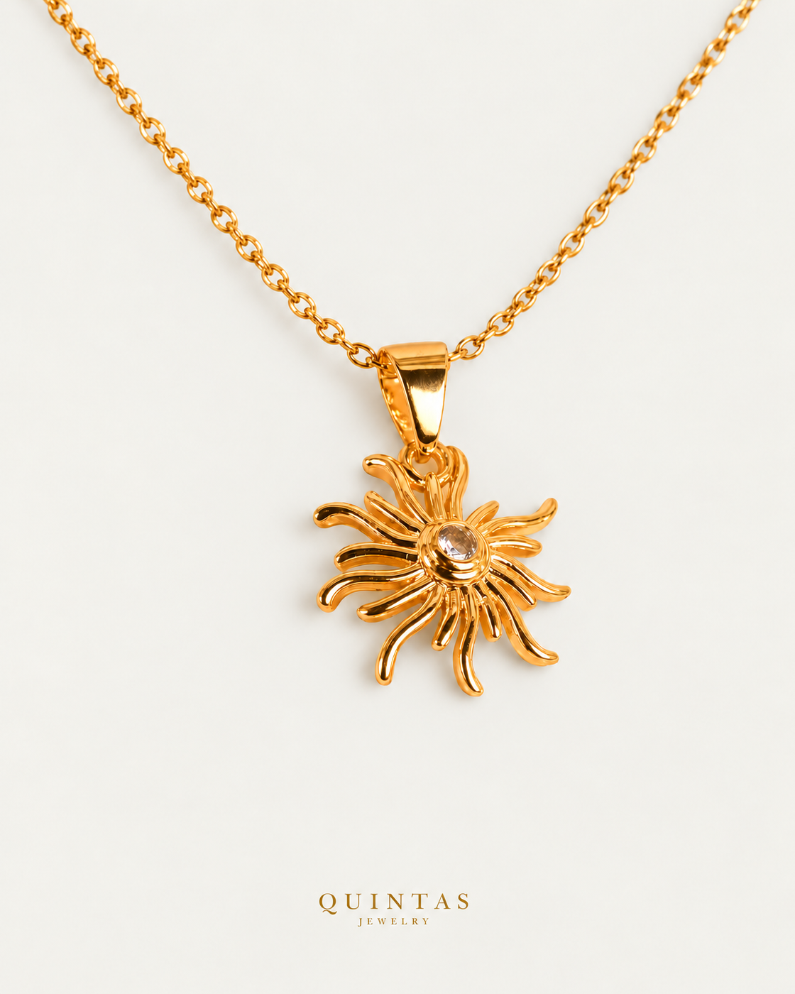 Tangled's Celestial Sun Necklace gold cable chain companion view, canonical Quintas logo