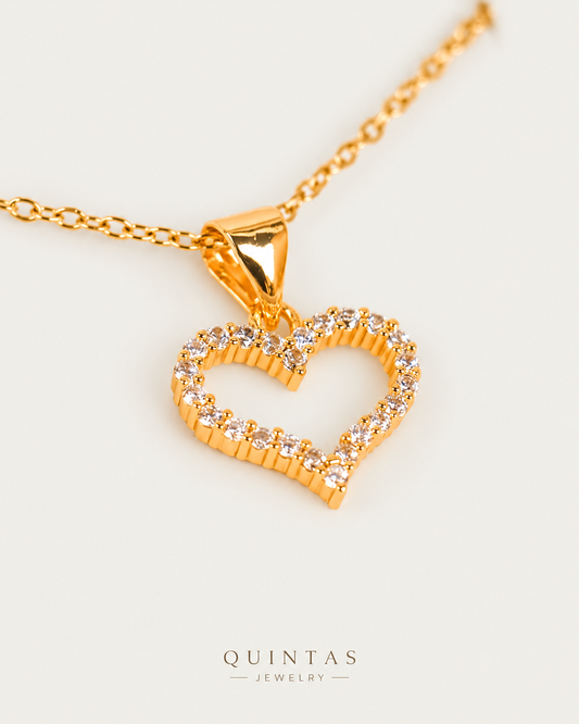 Althea Iced Heart Necklace — gold cable chain, genuine oblique angle, neutral greige