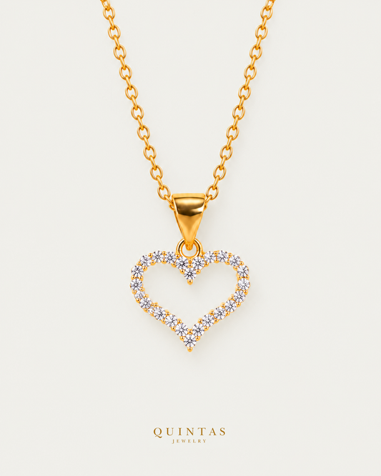 Althea Iced Heart Necklace on gold cable chain, hero angle, neutral greige
