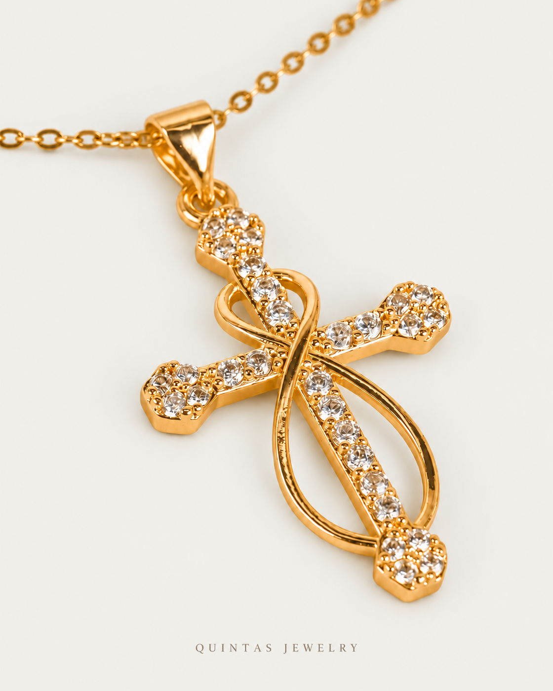 Infinity Faith Cross Necklace — gold cable chain, genuine oblique angle, neutral greige
