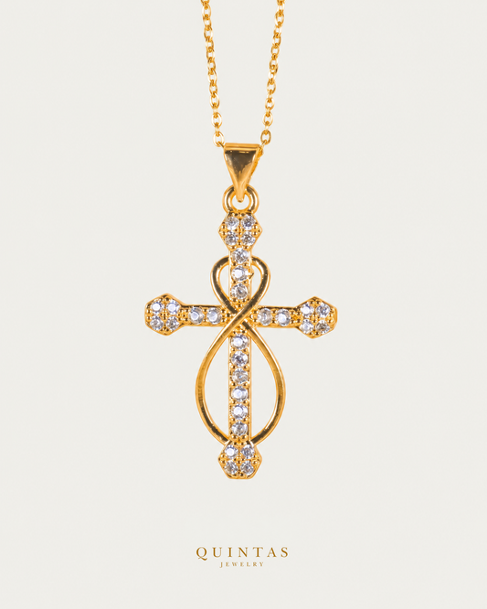 Infinity Faith Cross Necklace — gold cable chain, frontal hero, neutral greige