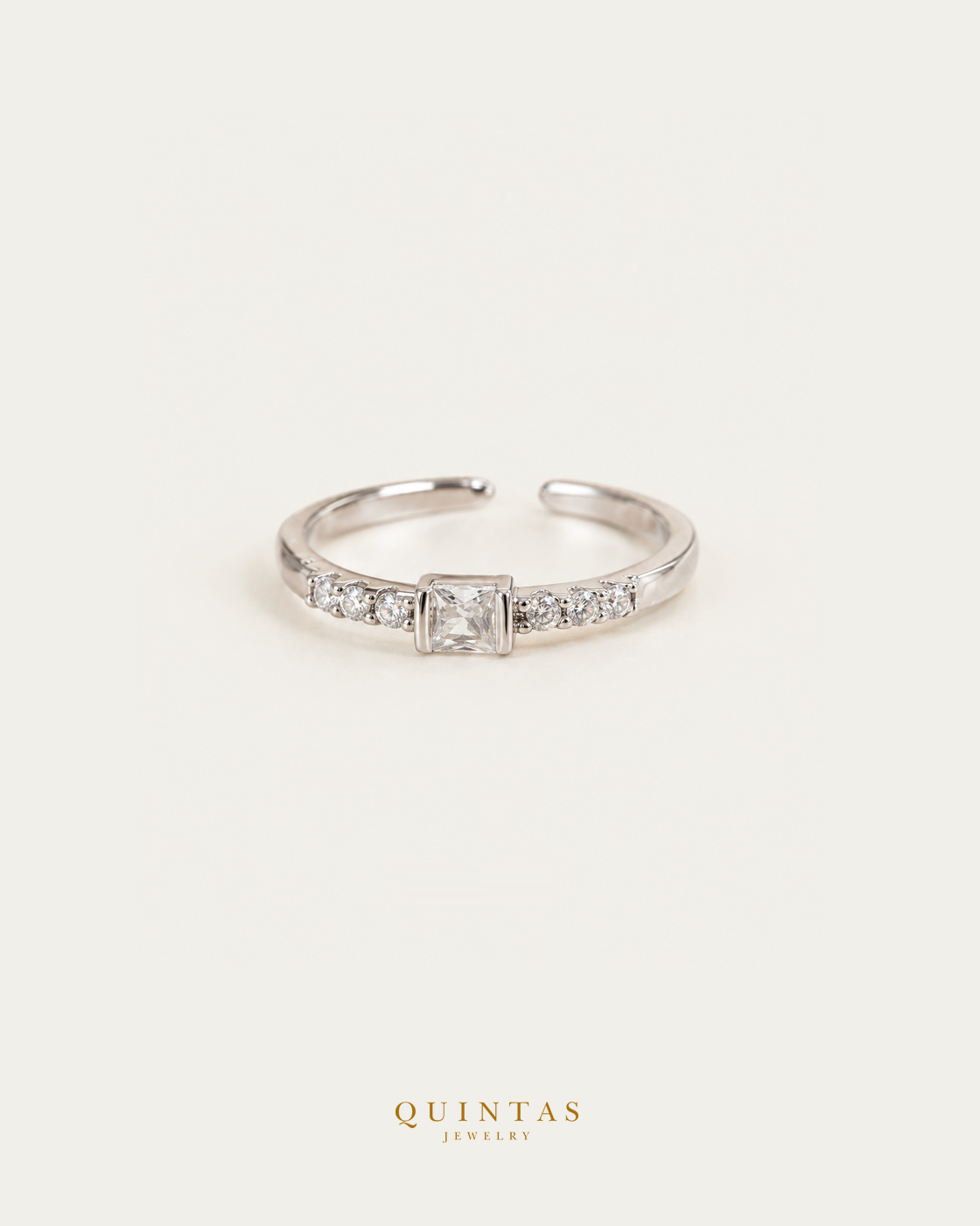 Jane Pure Elegance Silver Ring (Adjustable) standalone lying view with smaller framing on neutral greige