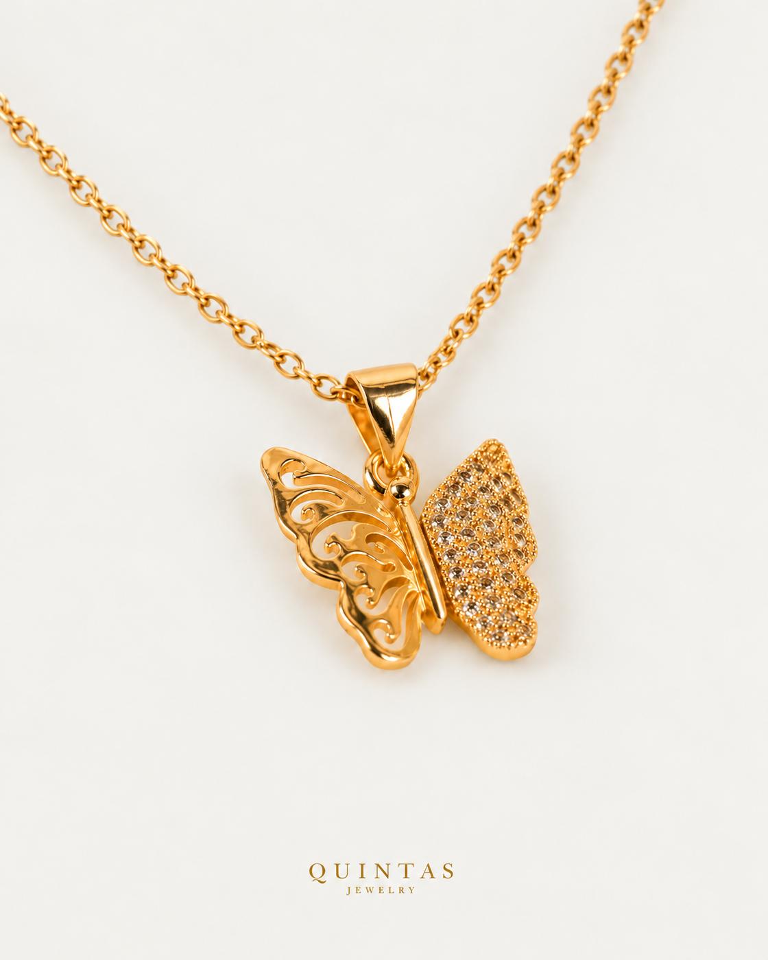 Mariposa Butterfly Necklace on gold cable chain, companion angle, neutral greige