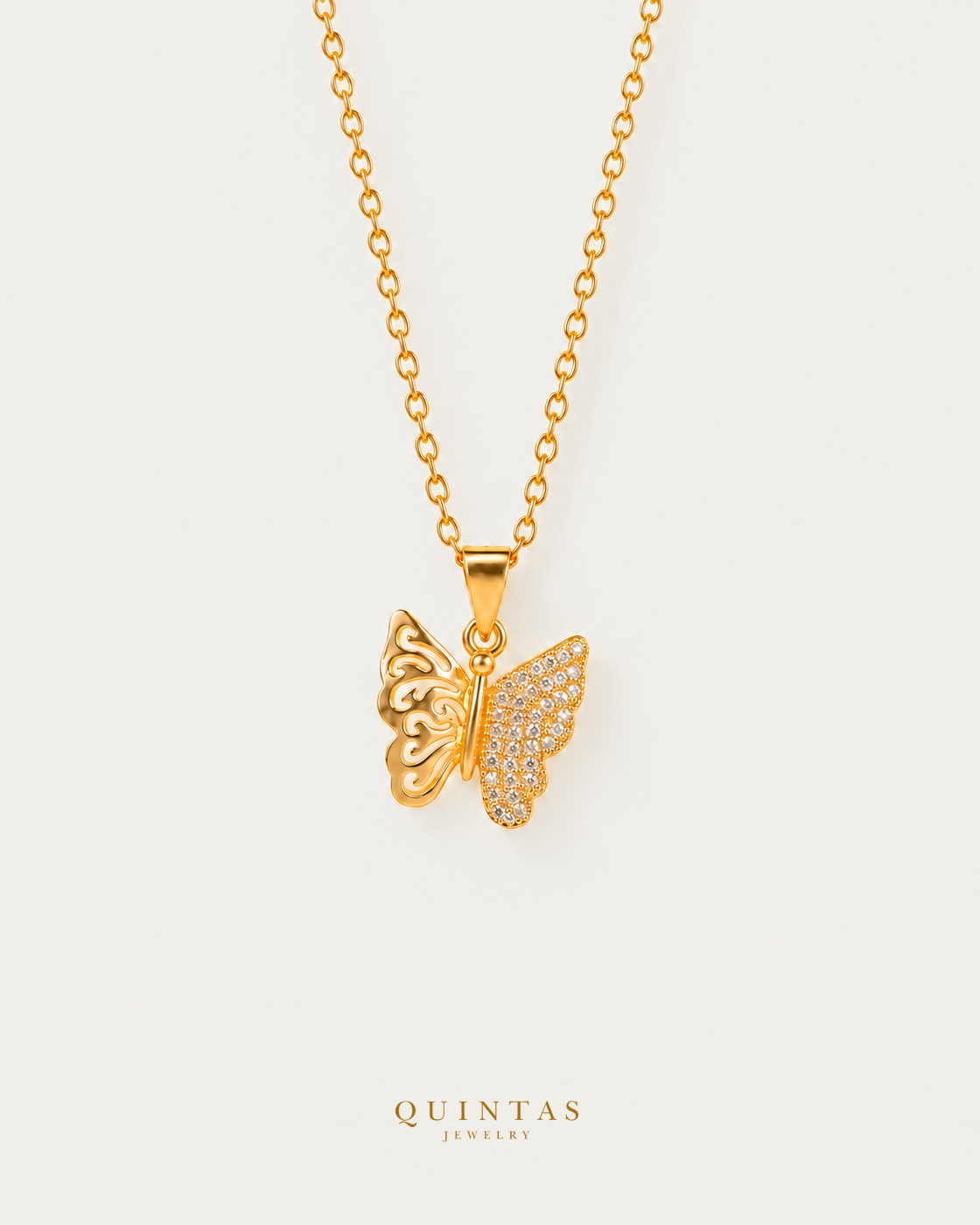 Mariposa Butterfly Necklace on gold cable chain, hero angle, neutral greige