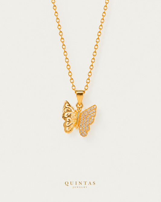 Mariposa Butterfly Necklace on gold cable chain, hero angle, neutral greige