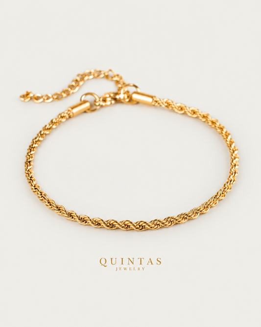 Matteo Rope Bracelet gold bracelet hero photographed angle on neutral greige