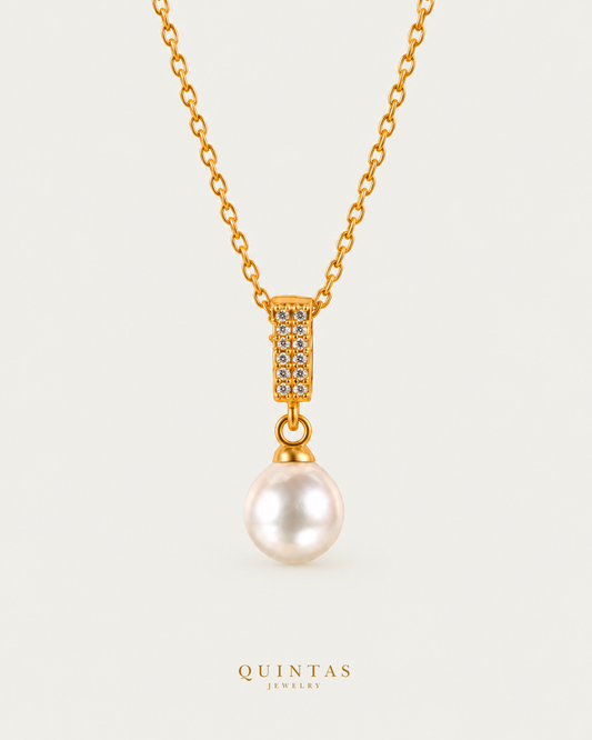 Majestic Pearl Necklace — gold cable chain, hero view, canonical Quintas logo