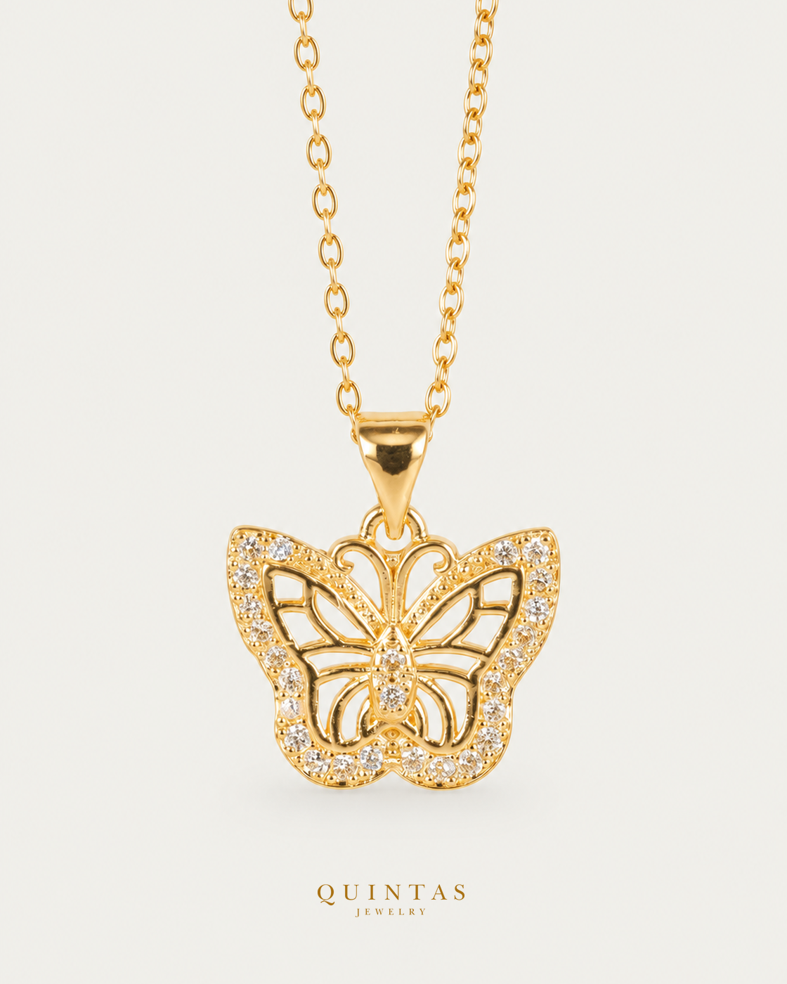 Charlotte Charming Butterfly Necklace gold cable chain main view, canonical Quintas logo