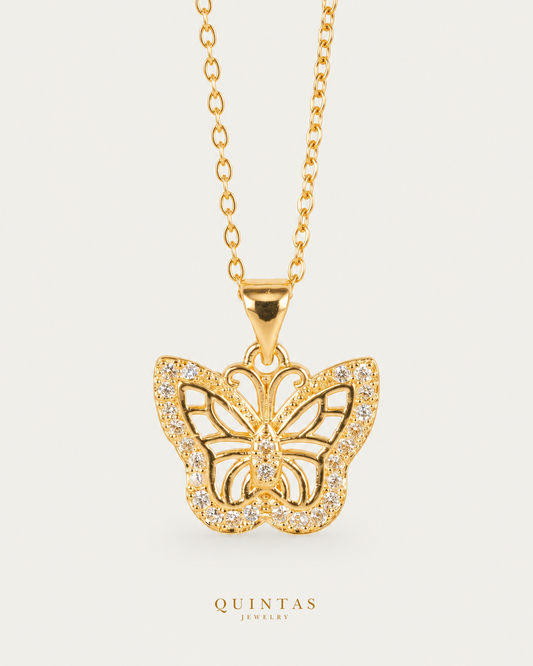 Charlotte Charming Butterfly Necklace gold cable chain main view, canonical Quintas logo