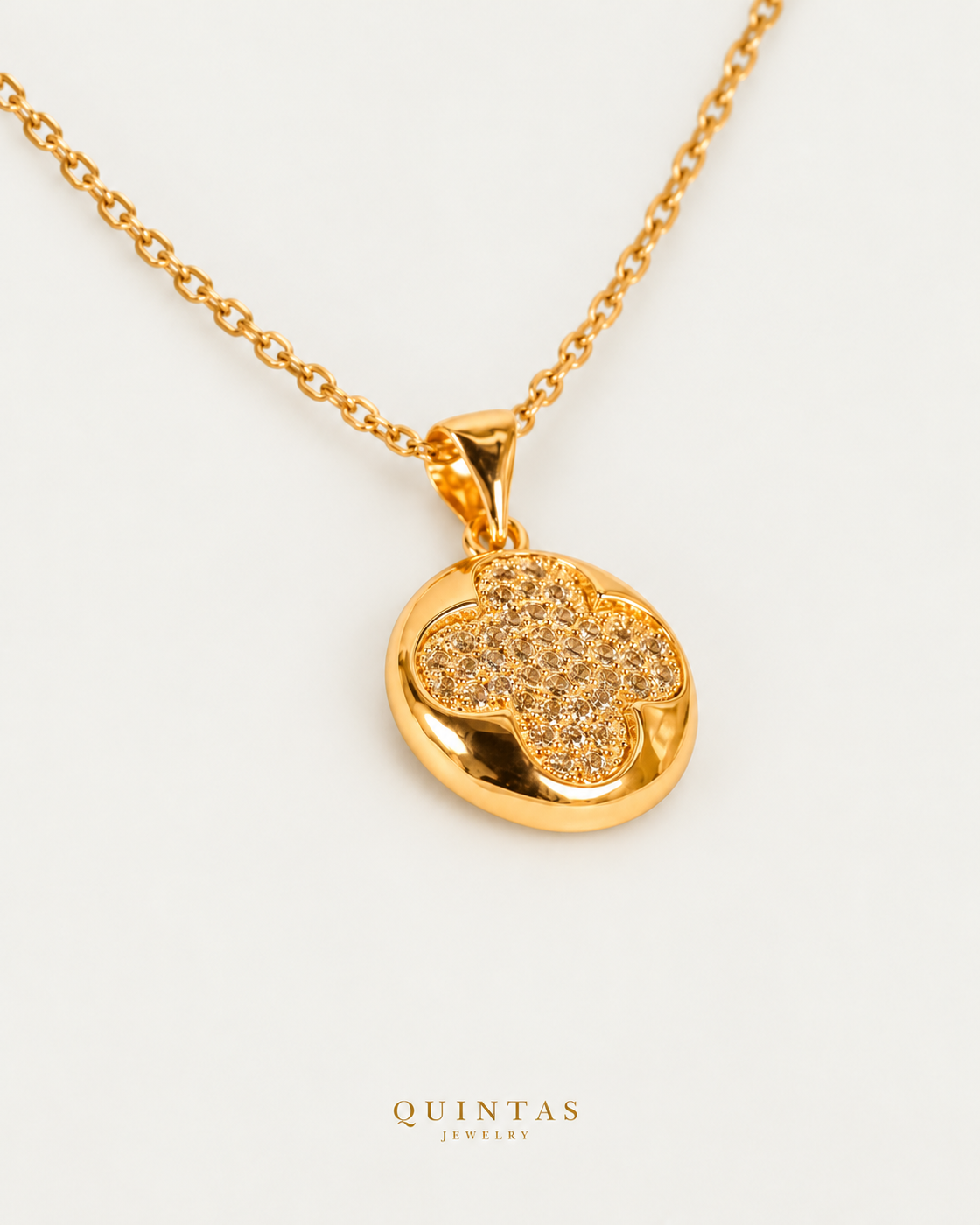 Golden Clover Necklace on gold cable chain, companion angle, neutral greige
