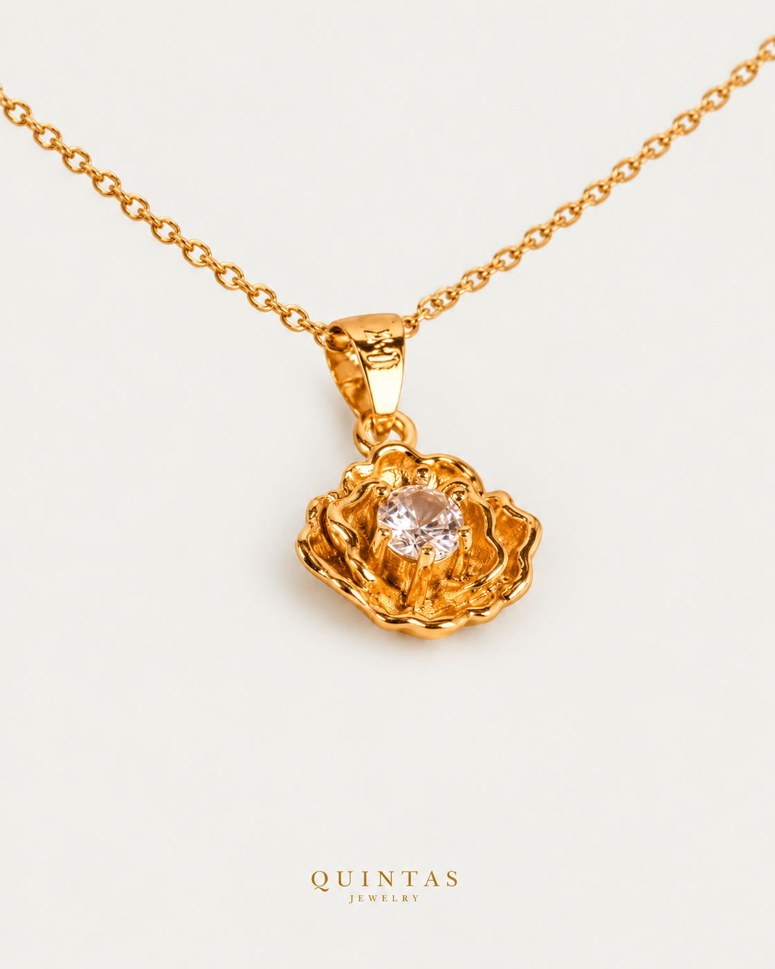 Flower Diamond Necklace on gold cable chain, companion angle, neutral greige