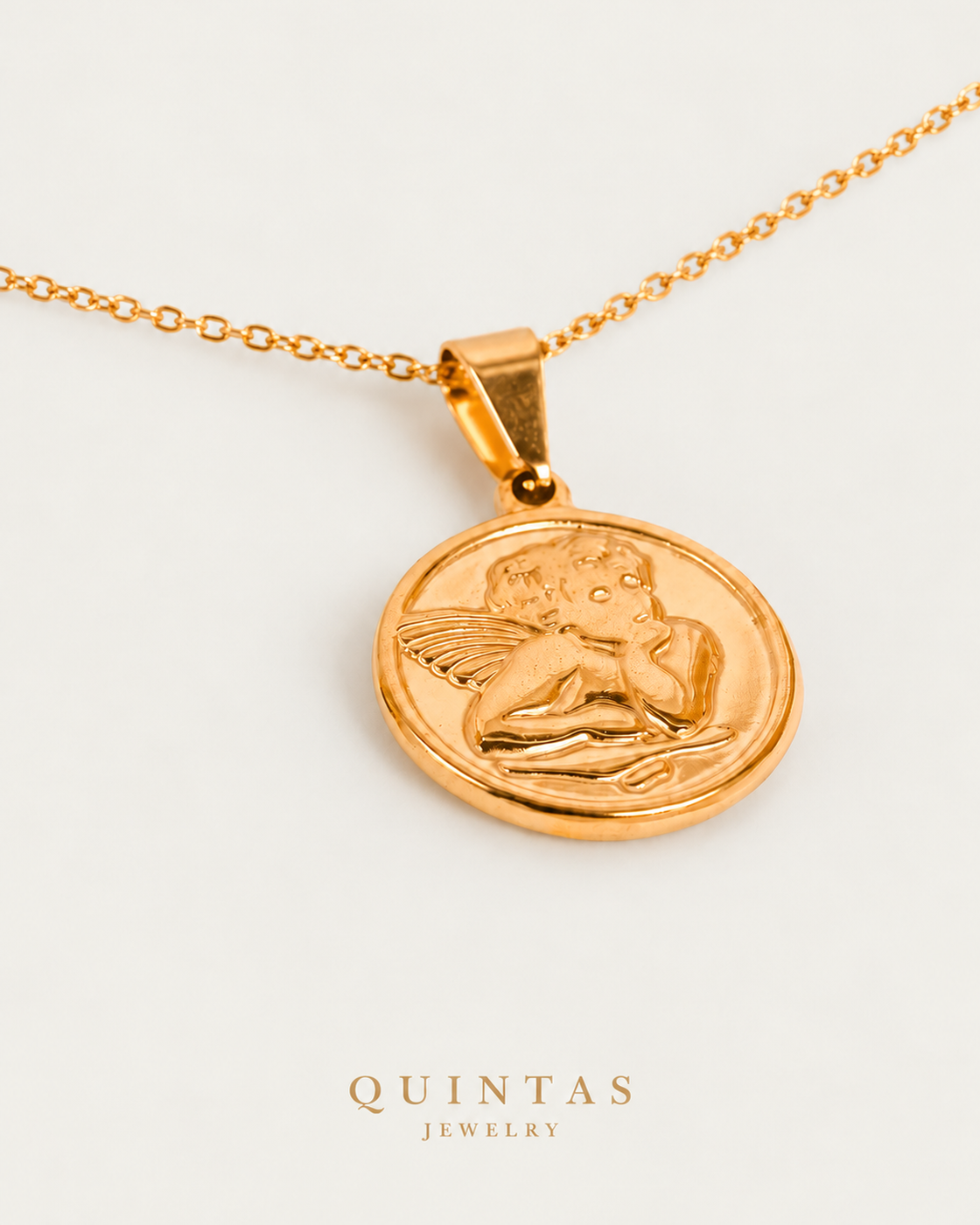 Guardian Angel Medallion Necklace cable companion photographed angle on neutral greige