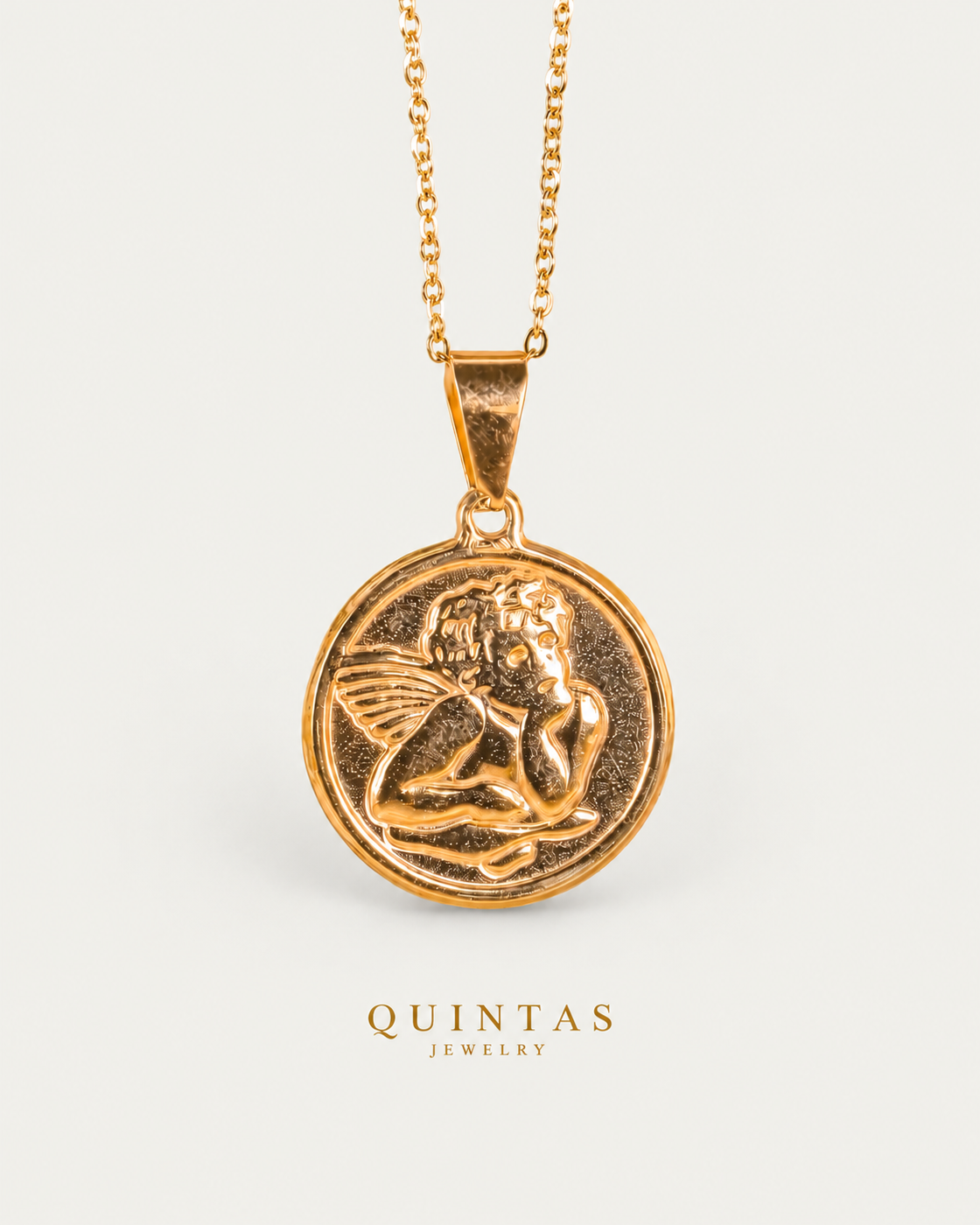 Guardian Angel Medallion Necklace cable hero photographed angle on neutral greige