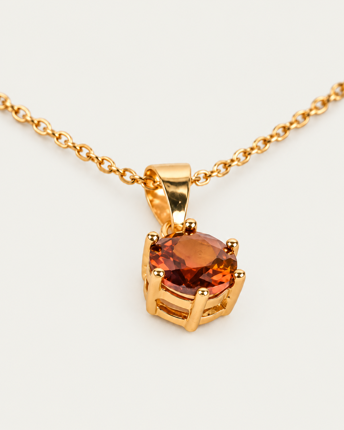Brilliant Gemstone Amber cable chain companion photographed angle on neutral greige