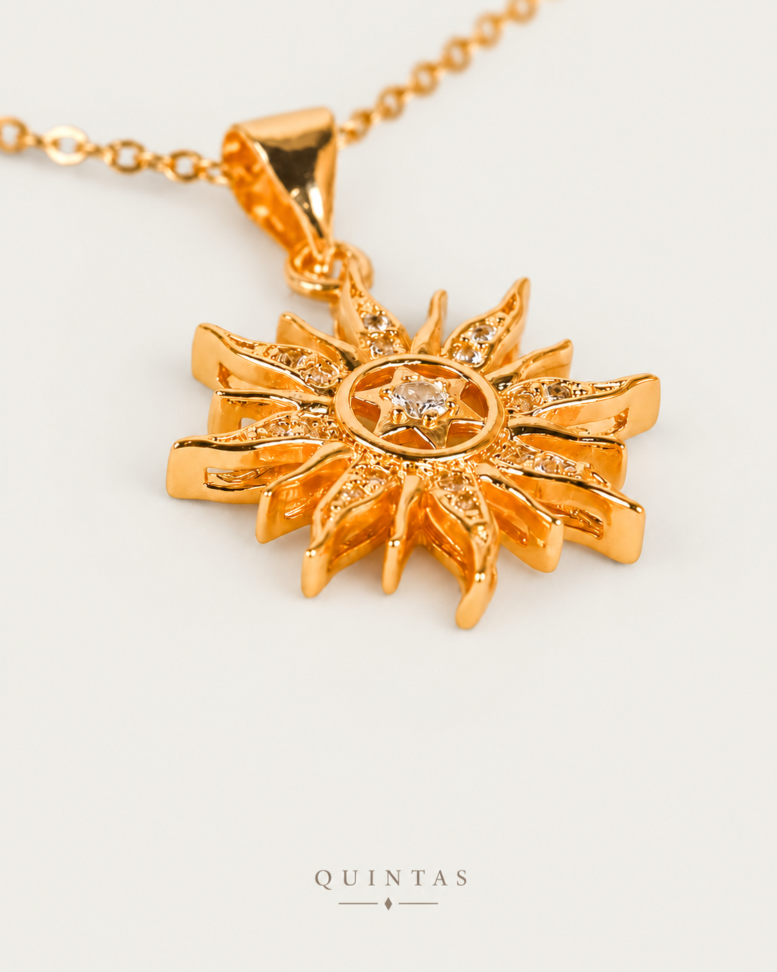 Solara Sun Necklace — gold cable, genuine oblique angle, neutral greige