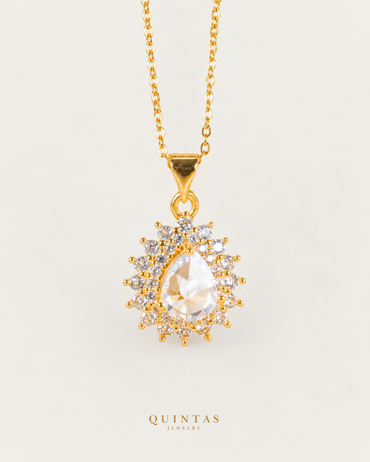 Aurora Diamond Halo Necklace on gold cable chain, hero angle, neutral greige