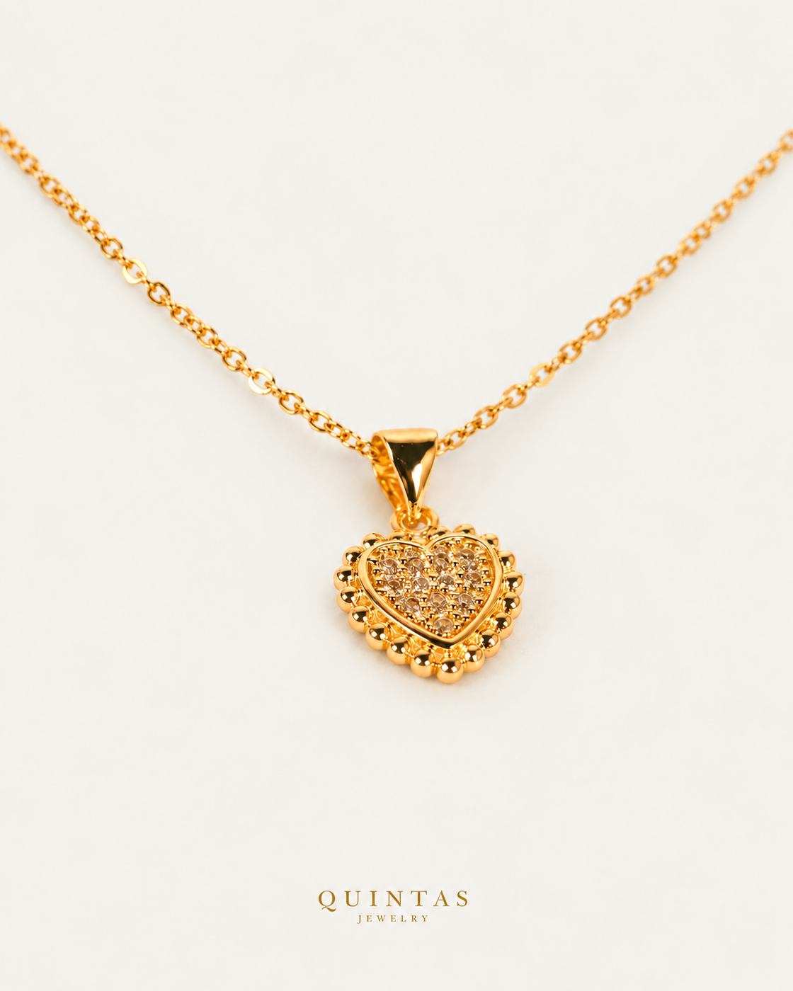 Carmela Heart Necklace companion with canonical Quintas Jewelry logo