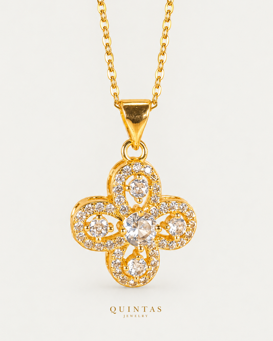 Seraphina Clover Charm Necklace — source-verified cable front view, off-white background, canonical gold logo