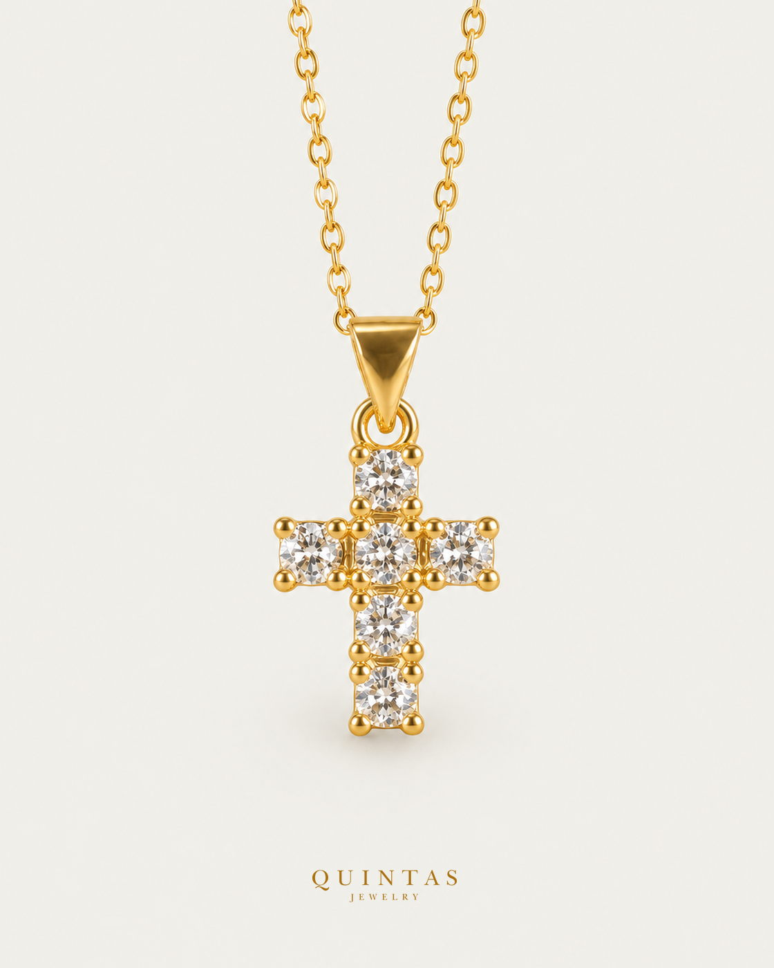 Sparkling Iced Cross Necklace on gold cable chain, hero angle, neutral greige