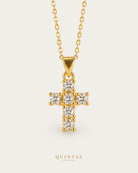 Sparkling Iced Cross Necklace on gold cable chain, hero angle, neutral greige