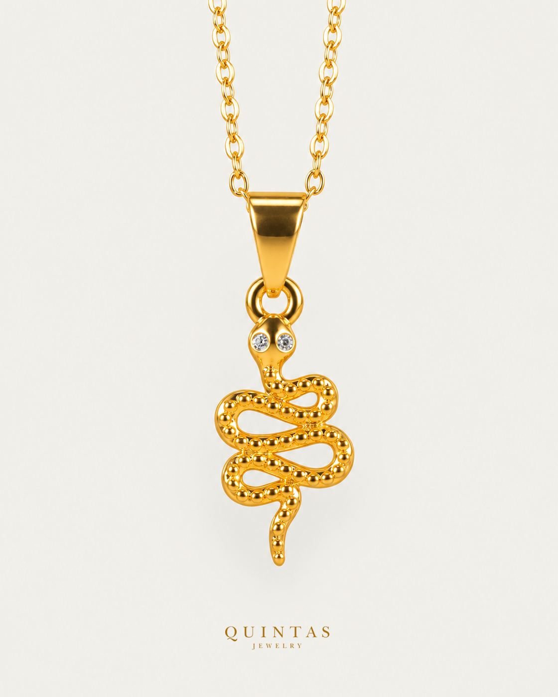 The Snake Necklace hero with canonical Quintas Jewelry logo