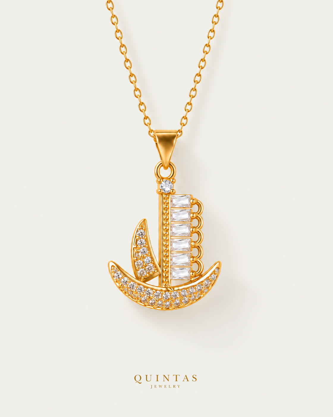 Voyager Ship Charm Necklace hero with canonical Quintas Jewelry logo