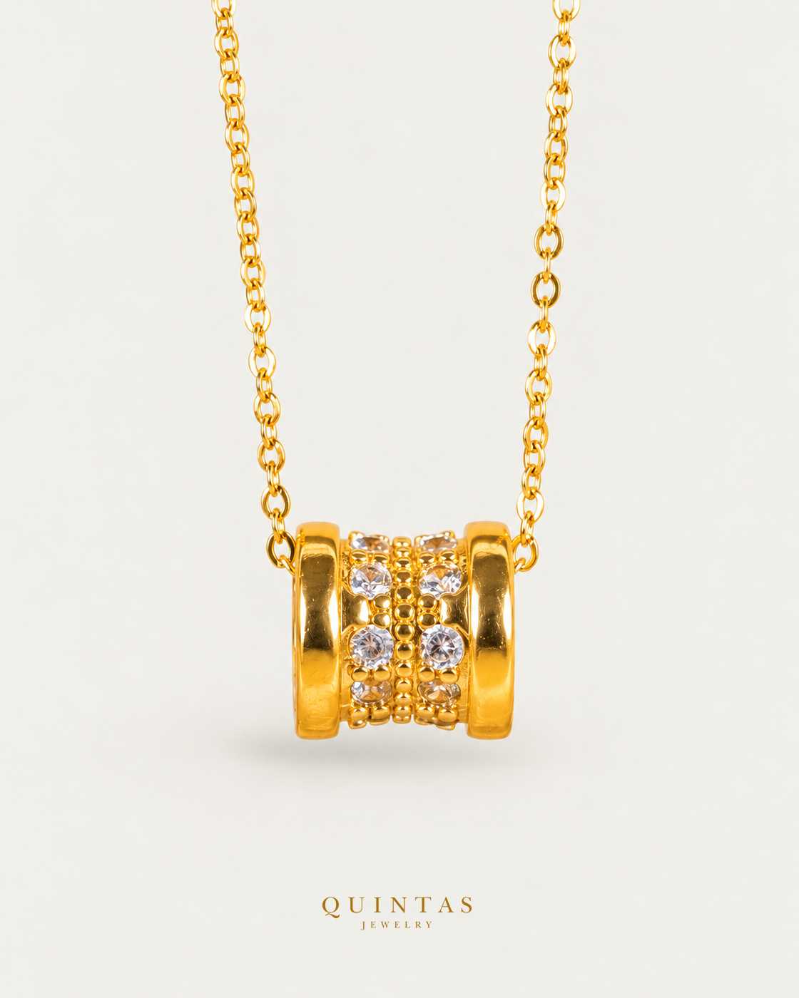 Elan Classic Barrel Necklace — gold cable chain, hero view, canonical Quintas logo