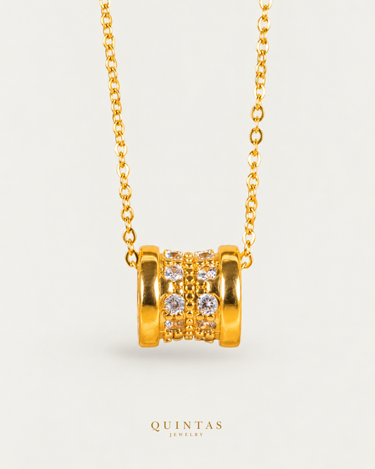 Elan Classic Barrel Necklace — gold cable chain, hero view, canonical Quintas logo