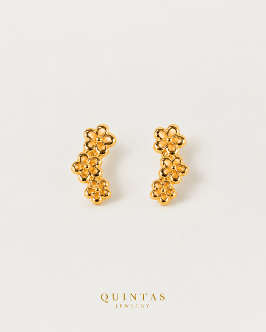 Althea Floral Stud Earrings, yellow gold stud earrings, neutral greige background