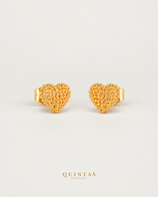 Amara Heart Stud Earrings, yellow gold earrings, neutral greige background