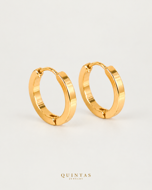 Arabella Golden Hoop Earrings, yellow gold hoop pair, neutral greige background