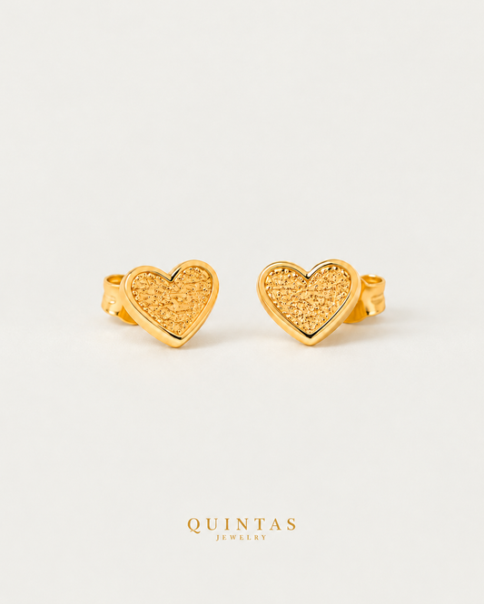 Carmina Heart Stud Earrings, yellow gold stud earrings, neutral greige background