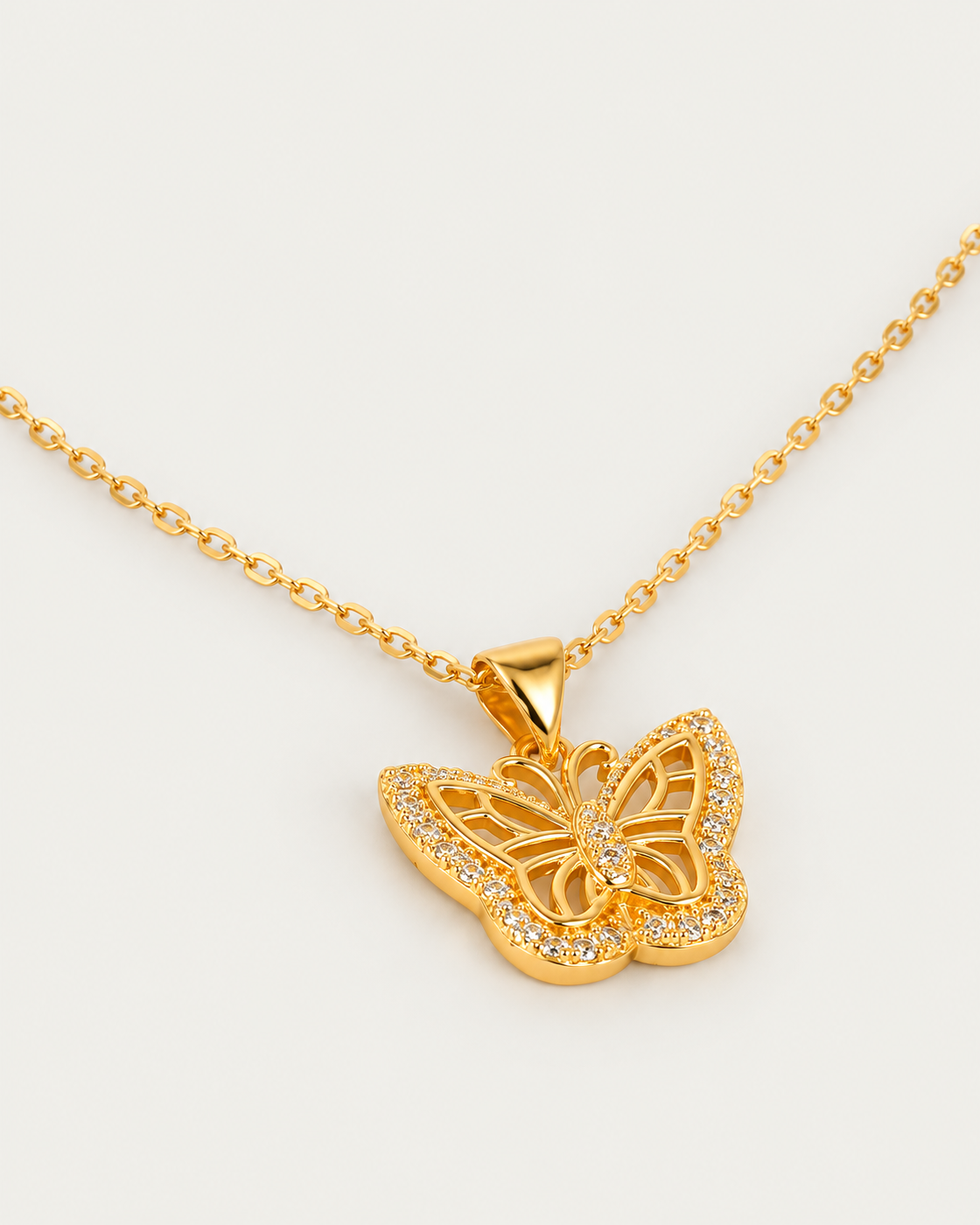 Charlotte necklace — actual cable-chain oblique view, neutral greige