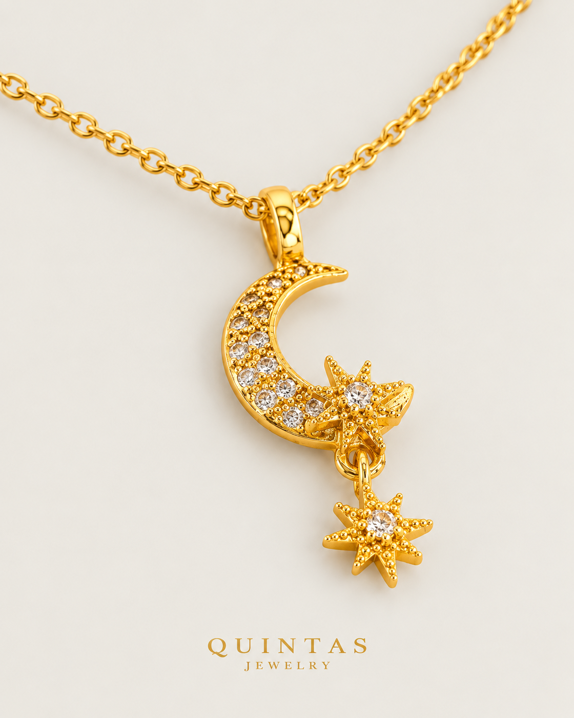 Gaia Moon and Star Necklace gold cable chain companion on neutral greige
