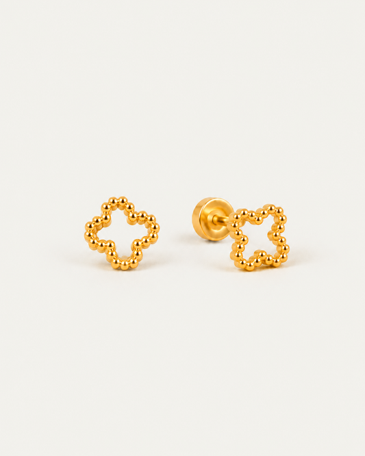 Golden Clover gold stud earrings, front and attached flat-disc profile