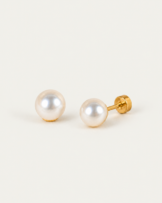 Grace Pearl stud earrings, front and attached-disc profile