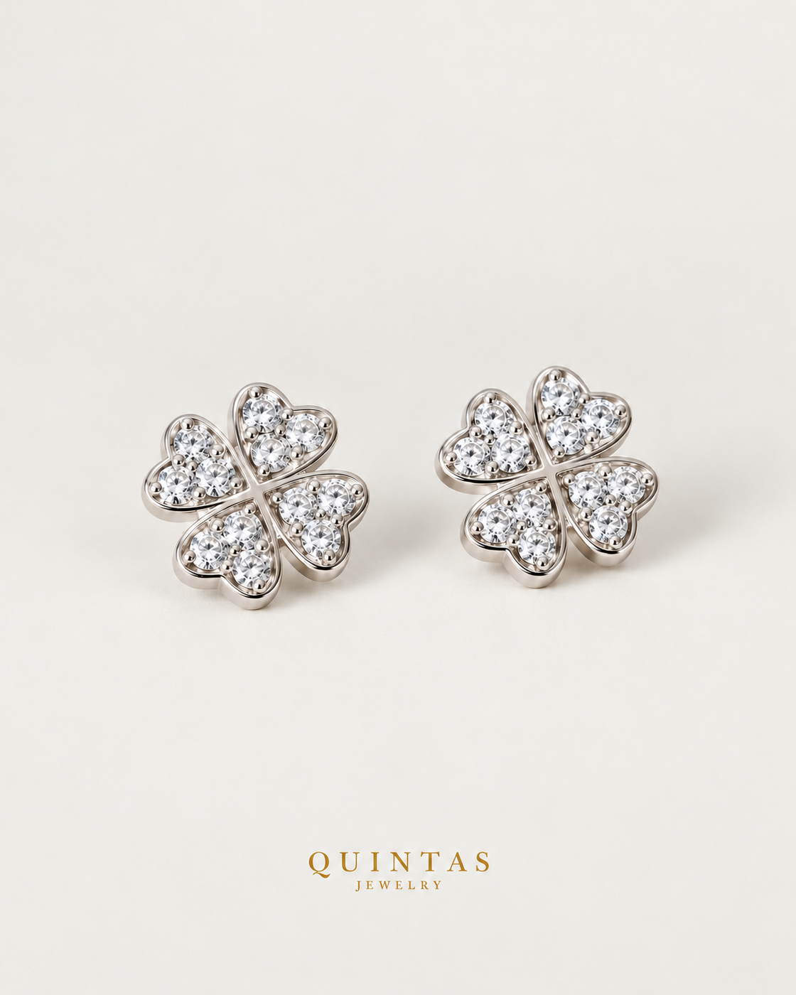 Lucky Clover Silver Stud Earrings, silver stud earrings, neutral greige background
