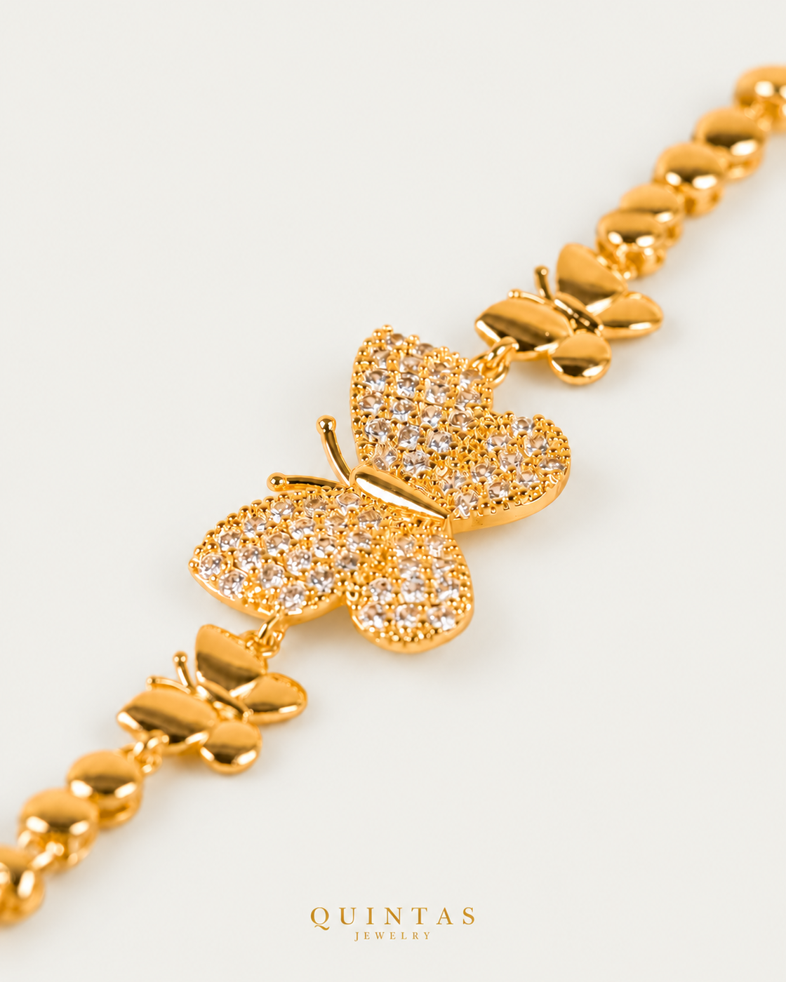 Mariposa Charm Butterfly Bracelet oblique detail on corrected neutral greige