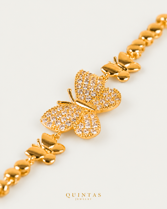 Mariposa Charm Butterfly Bracelet oblique detail on corrected neutral greige