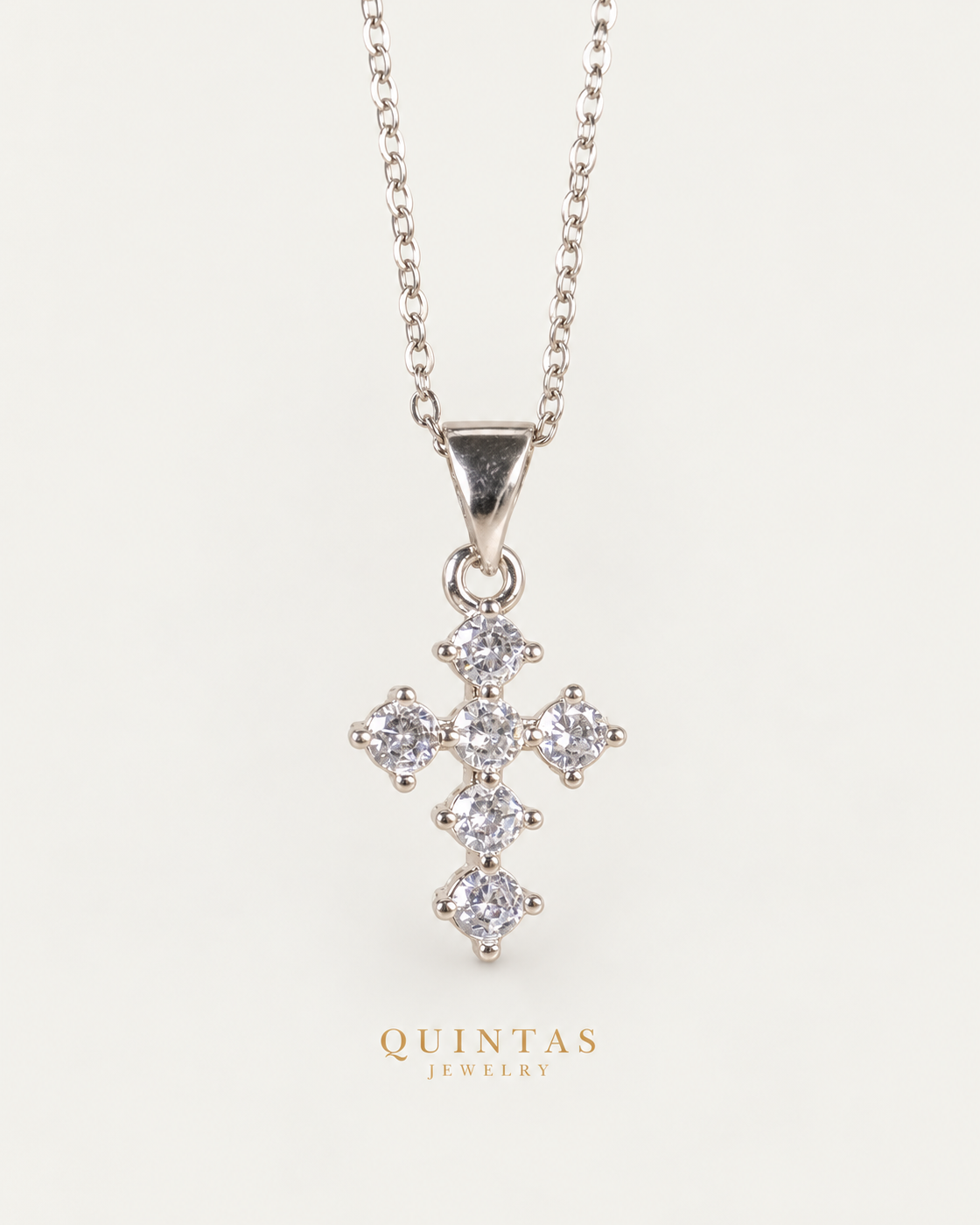 Mini Iced Cross Silver Necklace, full physical-source view, neutral greige