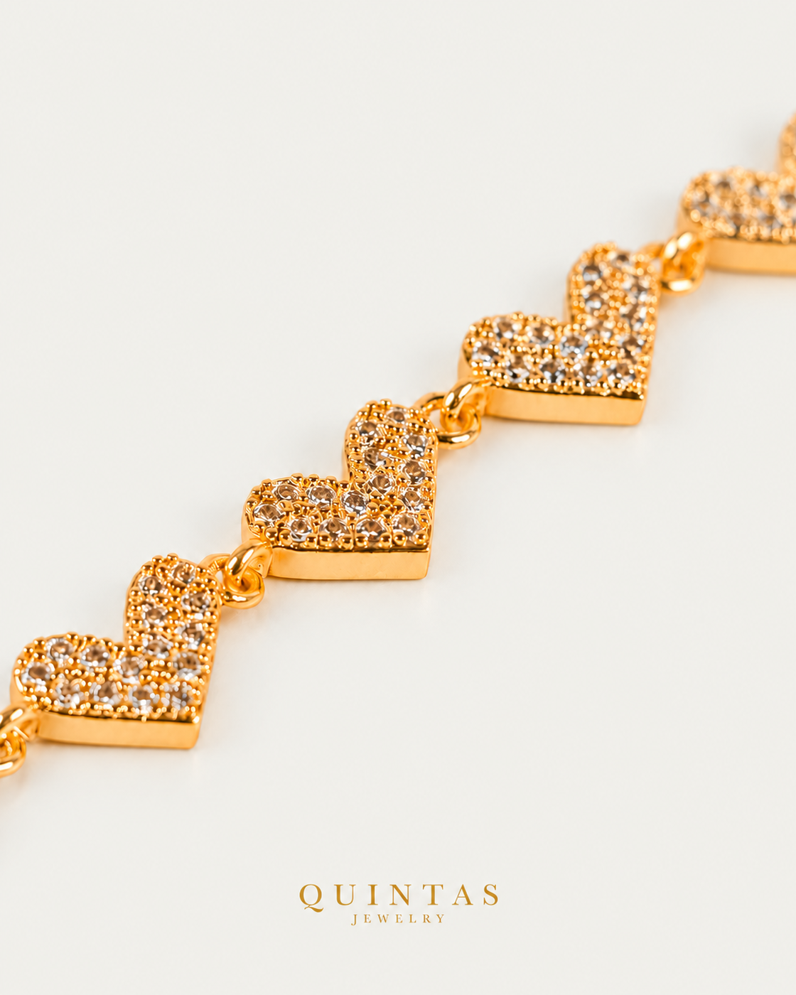 Novaria Hearts Charm Bracelet companion on neutral greige